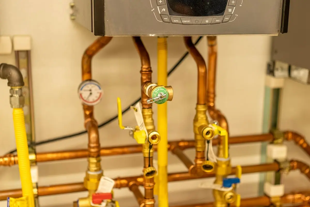 Licensed technician providing Water Heater Installation for a homeowner in Winooski